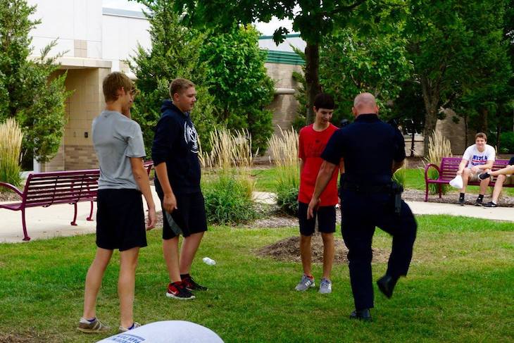 <p>Officer Howe showing off his hacky sack skills with students at lunch. He can hold his own!</p>
