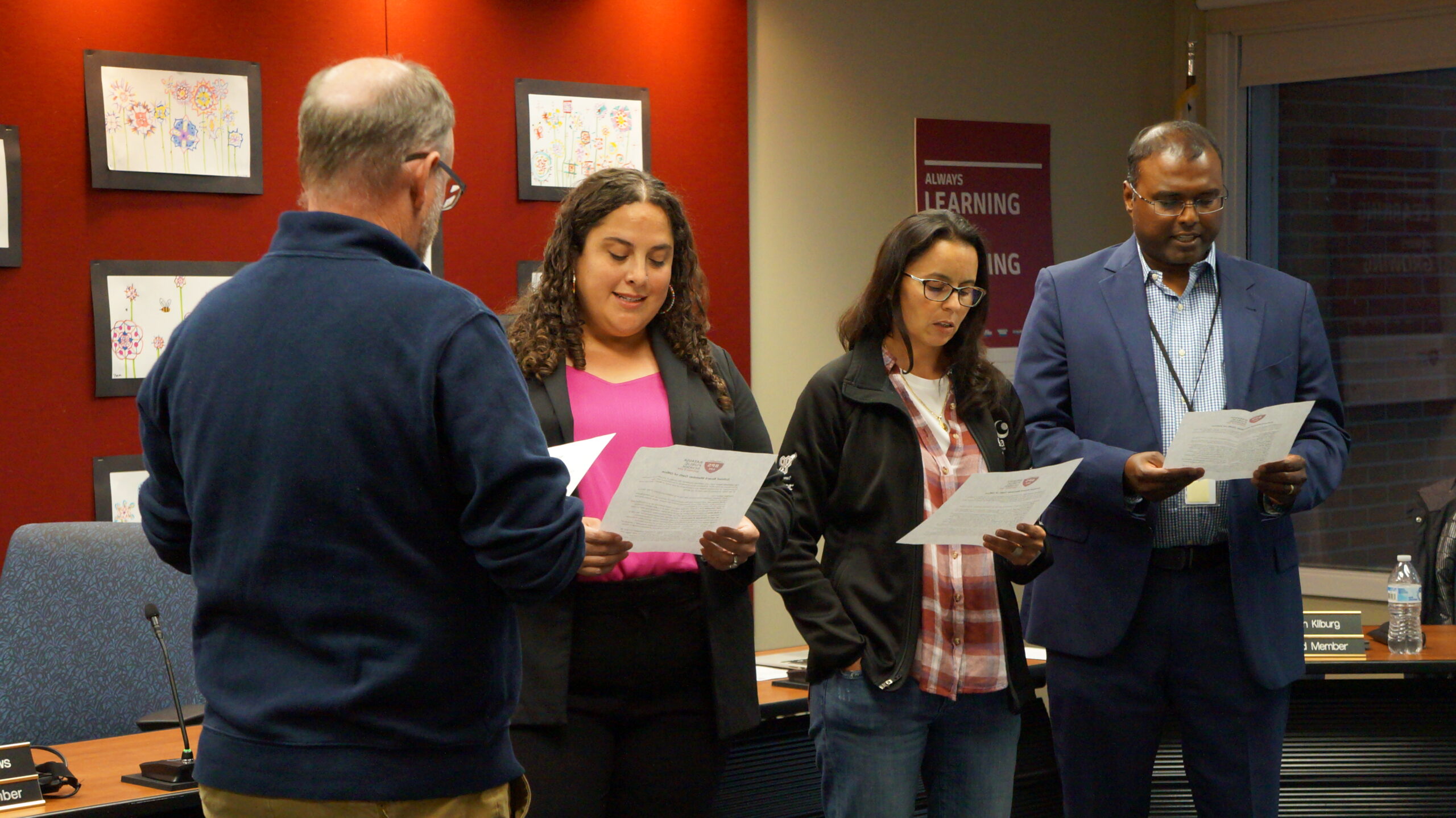 <p>President Meadows swearing in three new Board Members: Danielle Sligar, Raquel Gonzalez-Thomas, and Rob Arulandu</p>
