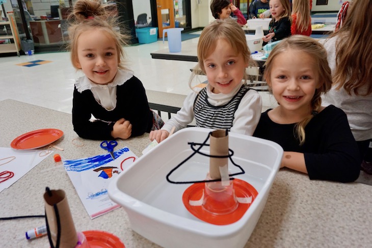 <p>This trio of students created a boat using a plastic-coated plate as the base. It worked perfectly!</p>
